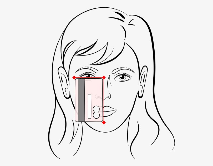 Step 2 Stand in front of a mirror-Hold the card steady and align one edge with the centre of your nose.